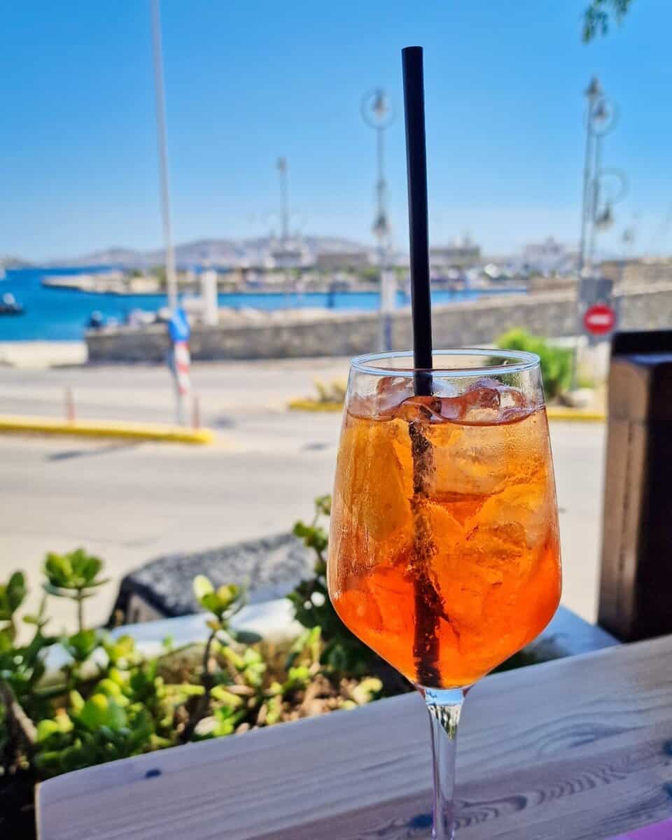 Aperol Spritz overlooking Tourlos Port on Mykonos
