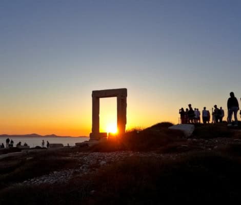 Spectacular sunset through Apollo's Gate on Naxos